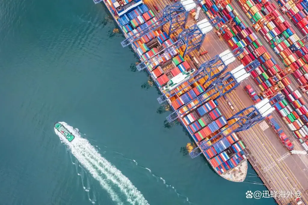 Aerial view of busy seaport container terminal with cargo ship, international ocean freight shipping for US market