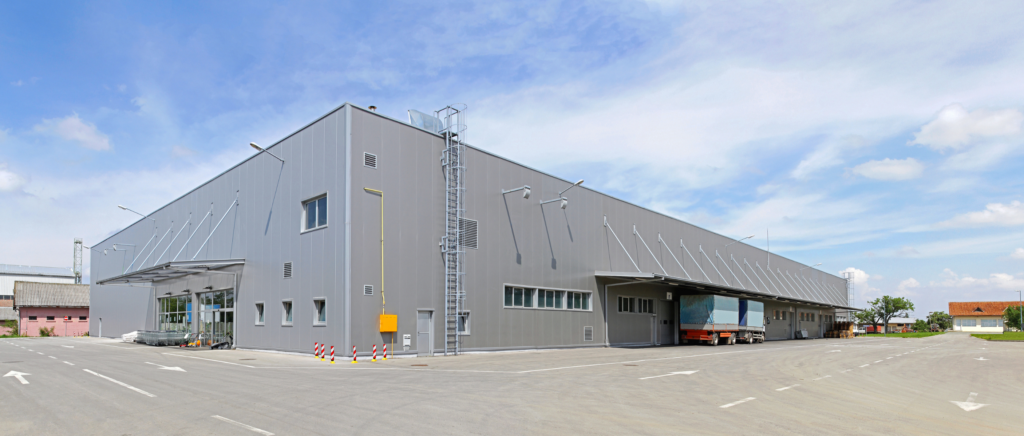 Exterior view of modern US west coast overseas warehouse, loading dock for cross-border e-commerce fulfillment