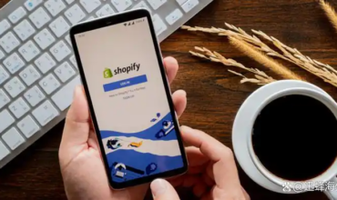 Hand holding smartphone showing Shopify login page for cross-border independent store sellers 