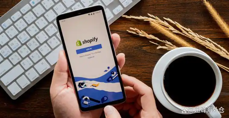 Hand holding smartphone showing Shopify login page for cross-border independent store sellers 