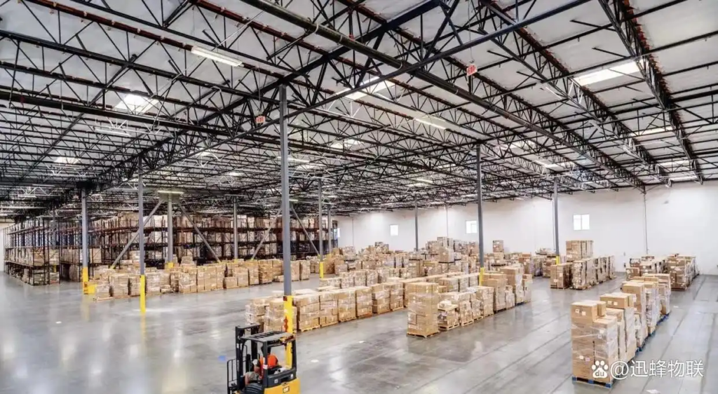 Spacious US fulfillment warehouse with stacked inventory and forklift