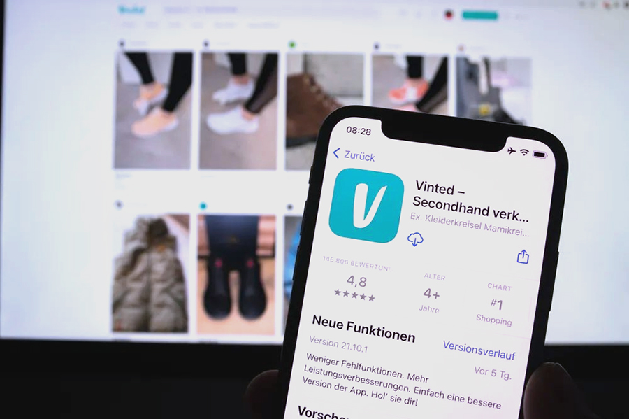Vinted app store screenshot on smartphone, European pre-loved fashion mobile app